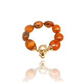 18 kt rose gold skull  bracelet  with carved amber