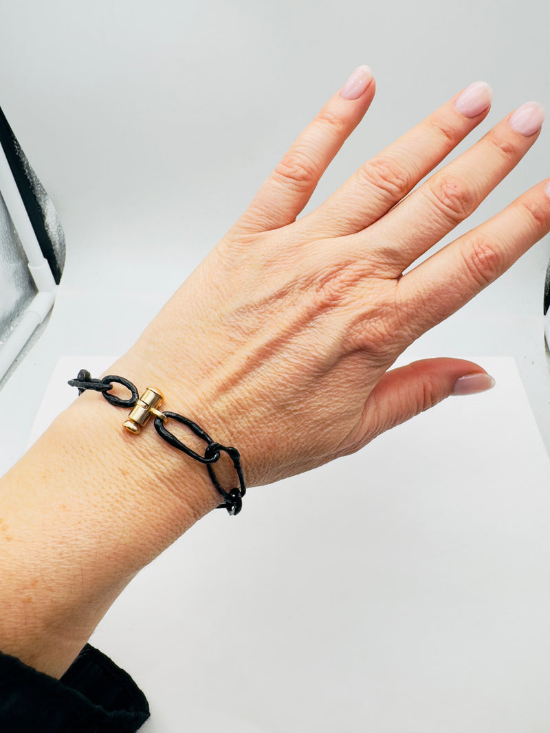 Sterling Silver Oval Bracelet Plated in Black Enamel With Gold Clasp