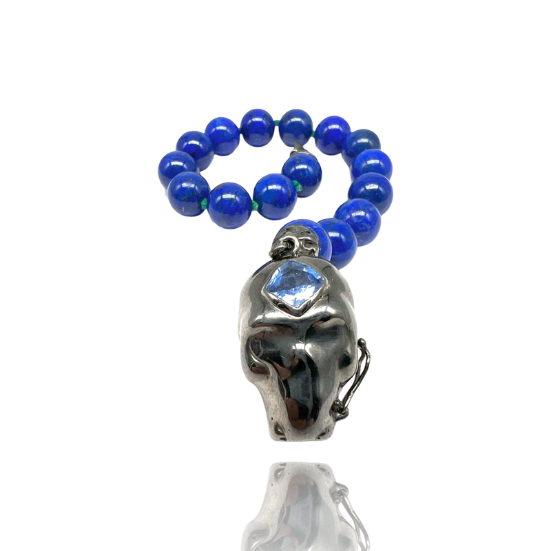 Sterling Silver Big Skull bracelet with lapis beaded and blue sapphire