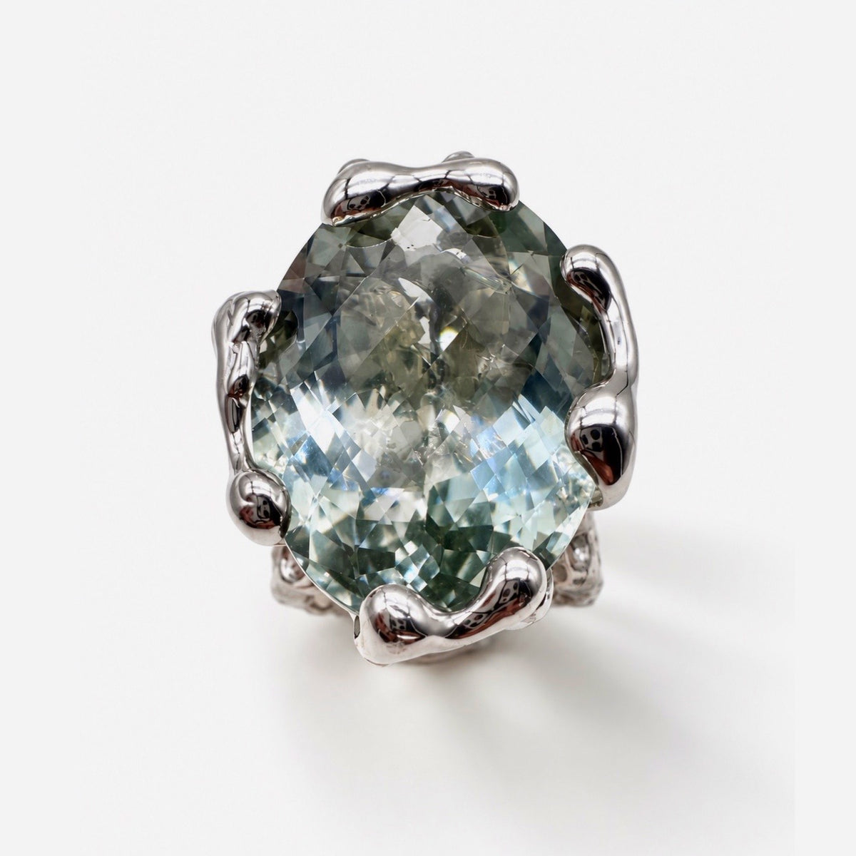 Sterling Silver plated in White Rhodium Pois Ring with Oval broiler cut green Quartz